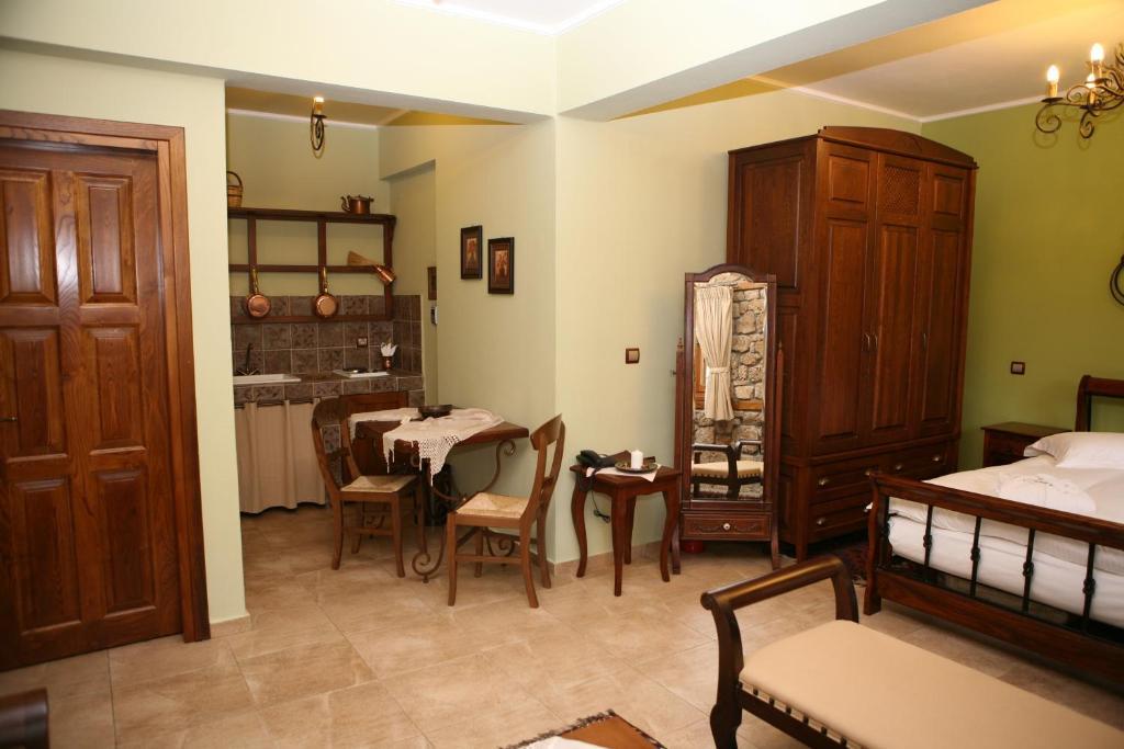 Roes Suites Loutraki  Bilik gambar